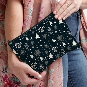 Navy blue winter cosmetic bag with white snowflake and Christmas tree festive prints
