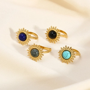 Lot de quatre bagues tournesol vintage dorées avec pierres naturelles et turquoise incrustées