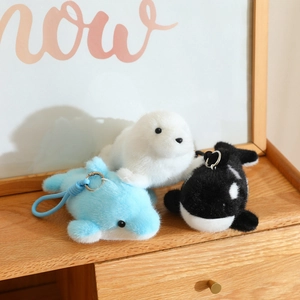 Cute plush sea animal keychains featuring dolphin whale and seal with blue woven straps