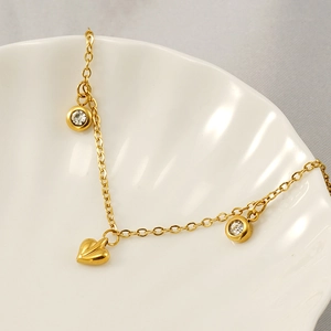 Double-layered 18K gold plated stainless steel anklet with heart and zircon charms