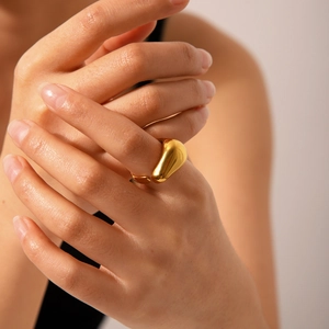 Irregular lava style water drop open ring in gold titanium steel on finger