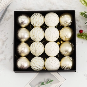 Detailed set of 16 assorted cream gold Christmas ornaments with matte and glitter finishes