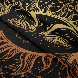 Close-up of bohemian sun tapestry fabric featuring golden celestial moon and star pattern