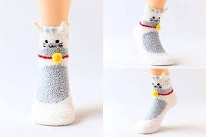 Detailed views of white and gray coral fleece cat socks with ears and small yellow bell