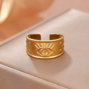 Adjustable gold stainless steel ring with embossed eye design and bohemian matte finish