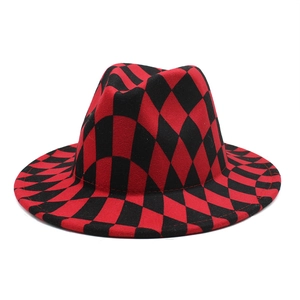 Classic red and black checkerboard fedora hat made of warm wool felt for autumn and winter