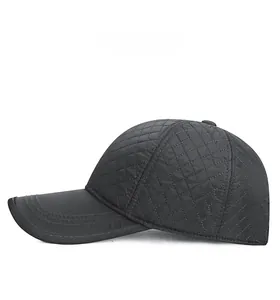 Side view of men's winter baseball cap featuring diamond quilted fabric and curved brim