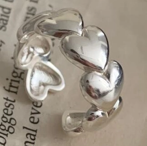 Bague ouverte en argent sterling S925 avec motif de cœurs 3D continus et poli miroir