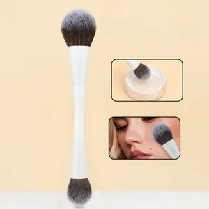 Dual-ended makeup brush detail showing dense bristles for liquid and powder application