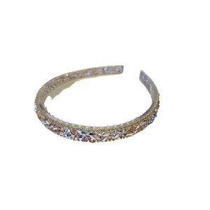 Elegant baroque crystal headband with champagne rhinestones on a gold frame for women