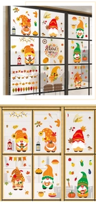 Detail of Fall gnome window clings with pumpkins and sunflowers for autumn decoration