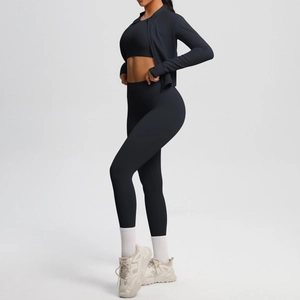 Three-piece black sports set featuring high-waist leggings, tank top and zip jacket