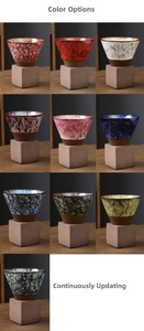 Macro detail of various Japanese-style ceramic teacups with unique kiln-transformed glazes