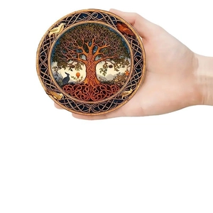 Handheld colorful Tree of Life wooden coaster with intricate Celtic knot patterns