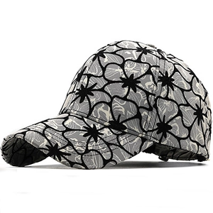 Detail of floral embroidery on grey baseball cap with high quality stitching and curved brim