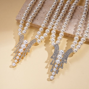 Elegant double-layered faux pearl necklace with sparkling rhinestone fringe pendants
