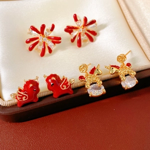 Three pairs of 18k gold plated horse earrings with red enamel and zircon in a jewelry box