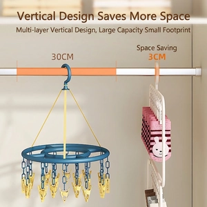 Space-saving blue circular drying rack with multi-clips for socks and small laundry items