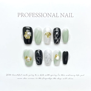 Handmade press-on nails set with emerald marble, pearl accents and gold leaf details