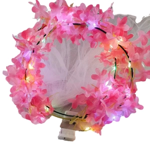 Pink floral crown headband with LED lights and white mesh veil for photography