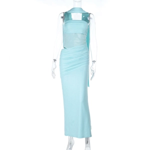 Detail of light blue sequined evening dress featuring waist cutouts and mesh texture