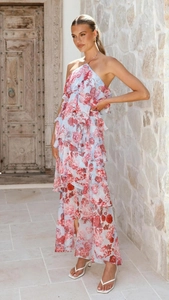 Detail showing the light blue floral chiffon fabric with layered ruffles on a maxi dress