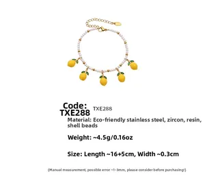 Detailed view of daisy lemon charm bracelet with pearls and adjustable gold-plated chain