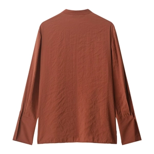 Relaxed fit brick red long sleeve shirt with textured fabric shown from the back view