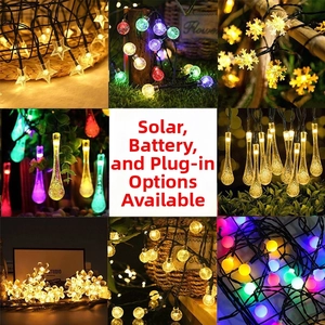 Detail view of various solar LED string lights including stars, balls and snowflakes shapes