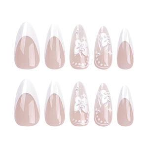 White French press-on nails with 3D bows and pearls on long almond shape tips