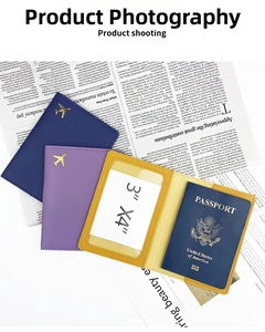 Close-up of leather passport holder with inner 3x4 inch card slot and gold airplane logo