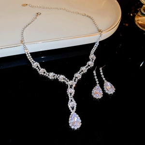 Elegant silver jewelry set with teardrop crystals necklace and matching earrings