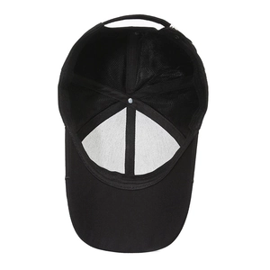 Inside view of classic black cotton baseball cap showing internal structure and brim
