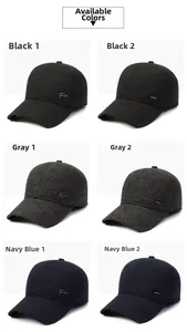Detail view of winter baseball caps in black, grey and navy with textured fabric finish