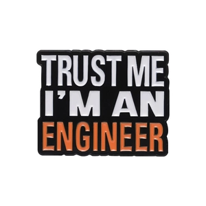 Minimalist Trust Me I'm An Engineer enamel pin badge for backpack decor, black and orange