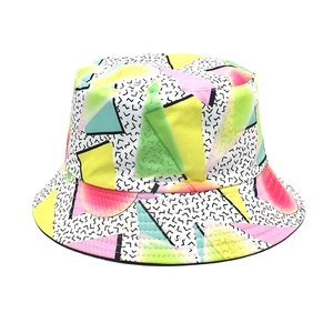 Detail of retro Memphis style bucket hat with vibrant geometric patterns and zigzag lines