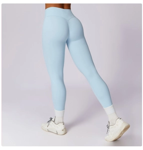 Close-up of light blue high-waist yoga pants featuring seamless butt-lifting design