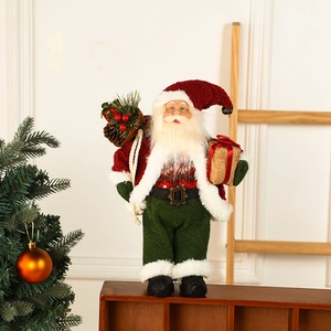 Creative Santa Claus figurine with knit sweater and gift box for festive home decor