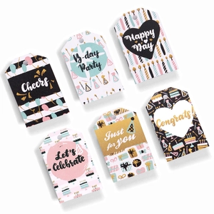 Colorful assorted gift tags with Happy Day and Congrats prints for gift packaging