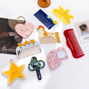 Chic acetate hair comb and mirror set in heart, star and horse shapes with glitter details