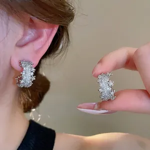 Sparkling silver C-shaped hoop earrings with micro-paved cubic zirconia for women