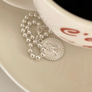 Minimalist S925 sterling silver bead chain bracelet featuring a vintage coin pendant