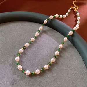 Vintage natural stone and pearl necklace with green faceted beads and gold metal accents