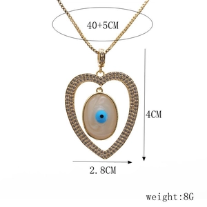 Detail of evil eye heart pendant with 40+5cm chain dimensions and jewelry weight