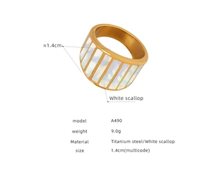 Detail showing gold titanium steel ring with white shell inlay and 1.4cm width specs