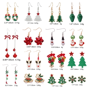 Detailed grid view showing Christmas alloy earrings dimensions and weights for each festive style
