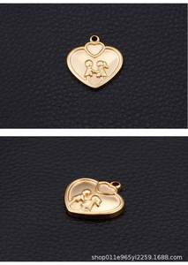 Macro detail of golden heart pendant featuring a couple relief pattern on black leather