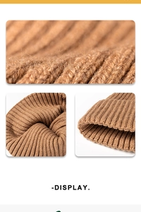 Macro detail of brown ribbed knit beanie showing textured fabric and high-quality stitching