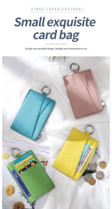 Detail of lychee pattern leather card holder with multiple slots and silver zipper