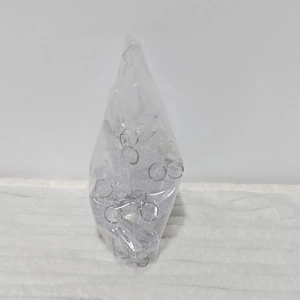 Bulk clear acrylic Christmas ornaments showing ice cones and snowflake accessories